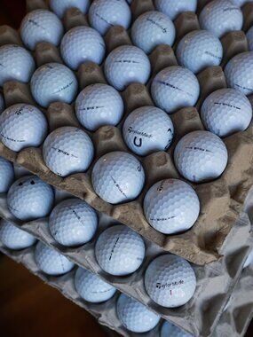 Two dozen (24) TaylorMade TP5 / TP5x golf balls